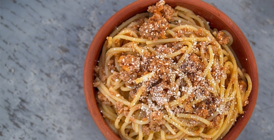 a bowl of spaghetti, a carbohydrate needed for young athletes